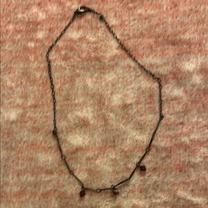 Elegant Purple and Black Necklace with Intricate Design